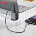 Lifestyle view of the XO L152 EU 18W Fast Charger Adapter with Micro USB Cable connected to a smartphone on a desk