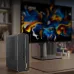 Workspace view of MSI PRO MAX EDGE AI+ 11M AI PC with MSI monitor displaying vivid abstract design in modern office setup.