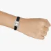 Wrist view of Casio LTP-1234LL-7ADF Watch with minimalist dial showing numerals 12 and 6 on black leather strap.