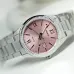 Close-up of the Casio LTP-1302DD-4A1VDF Watch displaying the pink dial, date window, and fluted bezel.