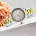 Angled front view of the Casio LTP-1302SG-7AVDF Watch highlighting its white dial and two-tone bracelet.