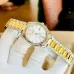 Close-up of the Casio LTP-1302SG-7AVDF Watch featuring the white dial, date display, and gold-tone accents.