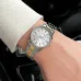 Close-up wrist viewpoint of the Casio LTP-1303SG-7AVDF Watch showing details of its silver dial and two-tone band.