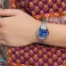Wrist viewpoint of the Casio LTP-V004D-2BUDF Watch with a patterned dress.