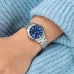 Wrist viewpoint of the Casio LTP-V004D-2BUDF Watch with a blue sweater.