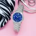 Top view of the Casio LTP-V004D-2BUDF Watch flat on a pink background.