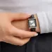 Wrist view of Casio LTP-V007L-7B1UDF Ladies Watch with silver dial and black leather strap worn with white shirt.