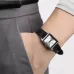 Close-up wrist view of Casio LTP-V007L-7E1UDF Ladies Watch with Roman numeral dial and black leather strap.