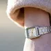Wrist view of Casio LTP-V007L-9EUDF Ladies Chain Watch with white dial worn casually with Guns N’ Roses T-shirt.