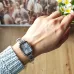 Casio LTP-V009D-2EUDF Ladies Chain Watch wrist close-up silver band white dial minimal markers with sweater sleeve