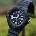 Front view of Casio MRW-200H-1B2VDF Analog Watch with black dial, white markers, and day-date display.