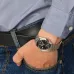 Lifestyle view of Casio MTP-1215A-1ADF Analog Watch with black dial styled with striped shirt and denim jeans.