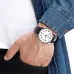 Lifestyle wrist view of Casio MTP-1303L-7BVDF Watch styled with denim jacket and casual outfit.