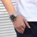 On-wrist viewpoint of the Casio MTP-1314D-1AVDF Analog Watch paired with a white t-shirt and dark trousers.