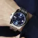 Close-up wrist view of the Casio MTP-1314D-2AVDF Analog Watch paired with a textured navy blue sleeve.