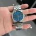 Handheld view of Casio MTP-B145D-2A2VDF Watch showing WR 50M marking and sleek silver band design.