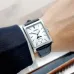 Wrist view of Casio MTP-M105L-7AVDF Watch with silver case, blue moon phase subdial, and dark leather strap.
