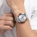 Wrist view of Casio MTP-V004D-7B2UDF Watch with metallic band, silver dial, and date window at 3 o’clock.