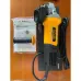 Set view of Tolsen 79542 Angle Grinder with auxiliary handle, wrench, and manual placed on wooden surface.