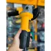 Handheld view of Tolsen 79542 Angle Grinder showing yellow body, gray head, and protective guard in workshop.