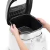 Delonghi FS6067 1.5 Liter Traditional Deep Fryer inner bowl being removed for cleaning