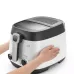 Delonghi FS6067 1.5 Liter Traditional Deep Fryer cooking fries visible through transparent lid