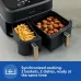 Front view of Philips NA352/00 9 Liter Air Fryer with dual baskets loaded with fries and grilled food.