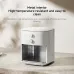 Countertop view of Xiaomi Air Fryer Essential 6L showing durable metal interior with dual control knobs.