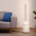 Lifestyle room view of beko EBA-6000-W Air Purifier showing bladeless fan beside sofa and plant in modern interior.