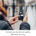 Lifestyle view of the Dyson HJ10 HushJet Air Purifier controlled via smartphone app showing remote air quality and airflow settings interface