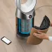 Close-up of Dyson TP12 Air Purifier with open panel revealing blue filter and smartphone app for smart monitoring.