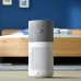 Bedroom view of Philips 3000i Series Air Purifier showing VitaShield and AeraSense icons in a cozy home setting.