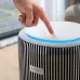 Philips PureProtect Pro 3200 Series Air Purifier with illuminated touch controls on the top panel.