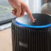 Philips PureProtect Pro 4200 Series Air Purifier with illuminated touch controls on the top panel.