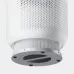 Bottom view of Xiaomi Smart Air Purifier 4 Compact Filter inside purifier base with perforated vents and metallic plate.