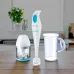 Kitchen counter view of Philips HR1351/90 Hand Blender set with blender, chopper, and measuring beaker beside utensils.