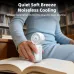 Close view of white Vyvylabs S17 handheld fan placed on an open book highlighting quiet cooling use indoors