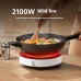 Lifestyle view of Xiaomi Mijia N1 Induction Cooker stir-frying shrimp and vegetables in wok with 2100W high firepower.