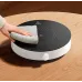 Lifestyle view of Xiaomi Mijia N1 Induction Cooker being cleaned with cloth, highlighting sleek design and easy maintenance.