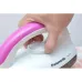 In‑use close‑up of the Panasonic NI‑317T Dry Iron in pink showing a hand gripping the handle during ironing.