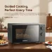 Front view of Oraimo InfiWave Oven on kitchen counter with food inside and dual dial control panel.