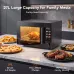 Kitchen view of Oraimo InfiWave Nova Oven with roasted chicken inside and plates of food on countertop.