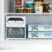 Freezer view of Hitachi R-VG690P7PB Refrigerator showing ice maker, frozen desserts, and packaged mussels.