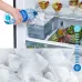 Close-up of Hitachi R-VGY490PB0 Refrigerator ice maker being filled manually, with fresh food and ice cubes visible.