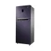 Side angled view of Samsung RT34K5532UT/D3 Refrigerator with digital display and closed doors.