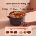 Hand adjusting the 3 heat settings control knob on an Oraimo electric hotpot filled with simmering beef stew.