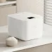 Xiaomi Multifunctional Rice Cooker 4L on a table 
