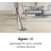 Front lifestyle view of the Dyson V8 115AW Vacuum Cleaner being used on a floor highlighting lightweight cordless stick design and mobility