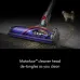 Close‑up cutaway view of the Dyson V8 115AW Vacuum Cleaner Motorbar head showing brush roll removing hair and debris from carpet.