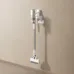Wall-mounted view of Xiaomi Mijia Vacuum Cleaner 4 on charging dock with sleek design and accessory holder.